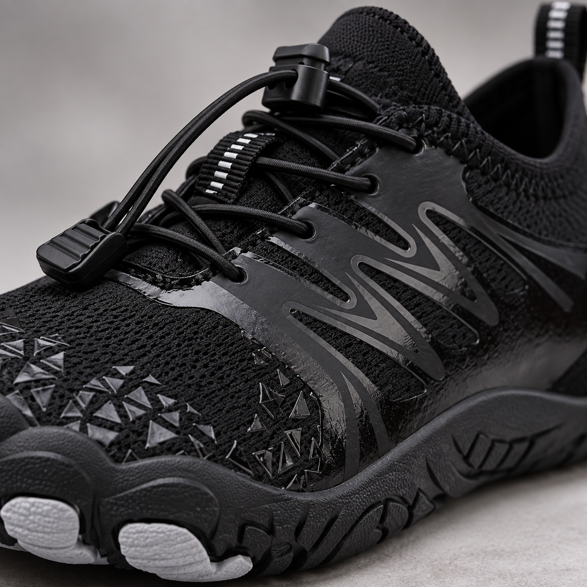 Ridgeline black shoes - close-up material and sole detail | OrthoKicks